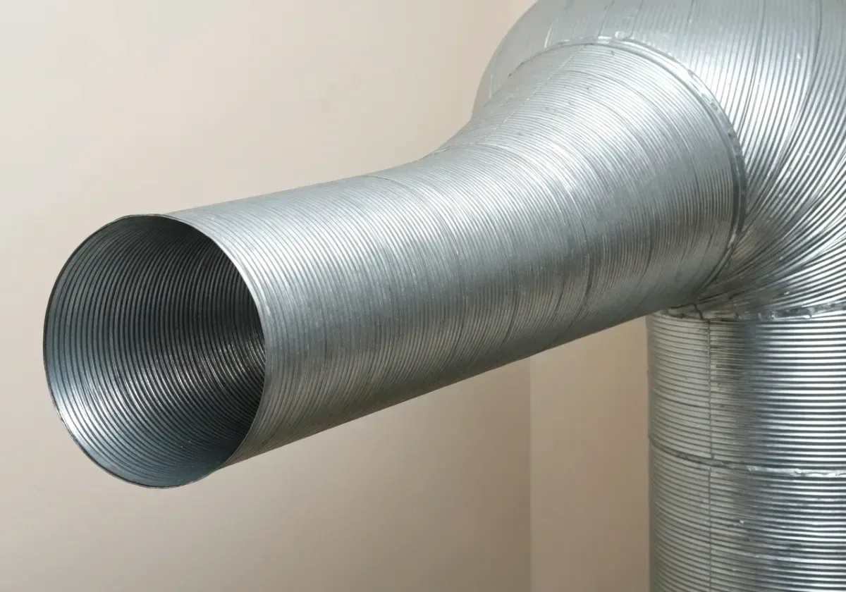 After — dryer vent cleaning: A lint-packed vent run opened up for shorter cycles and a cooler dryer.